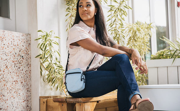 Person wearing the Everyday Cubelet cross-body.